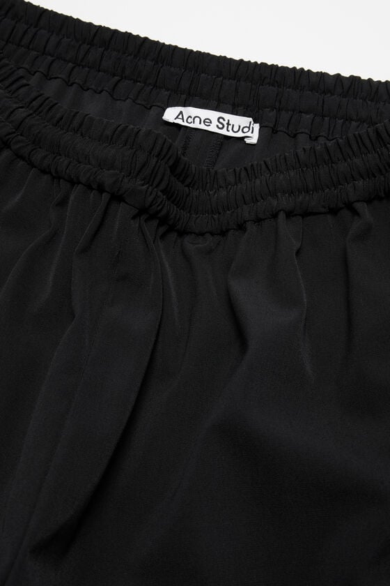 Acne Studios Figurnahe Hose Tägliche Deals