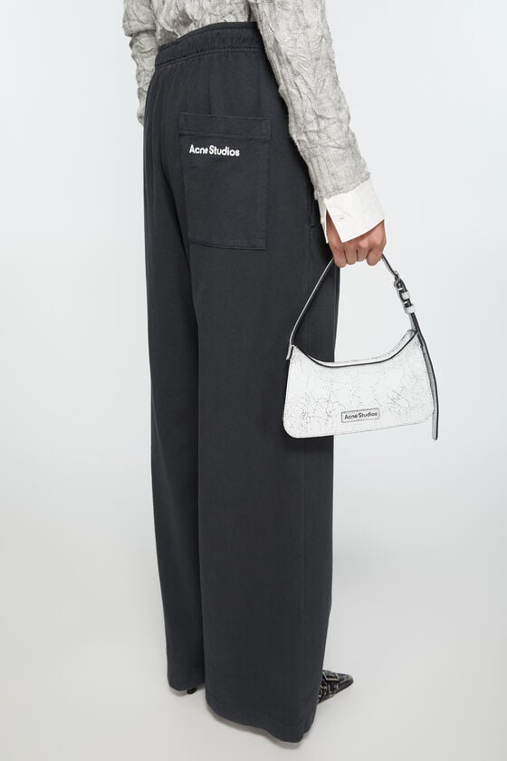 Acne Studios Jogginghose mit Logo-Stempel Black Friday Preise