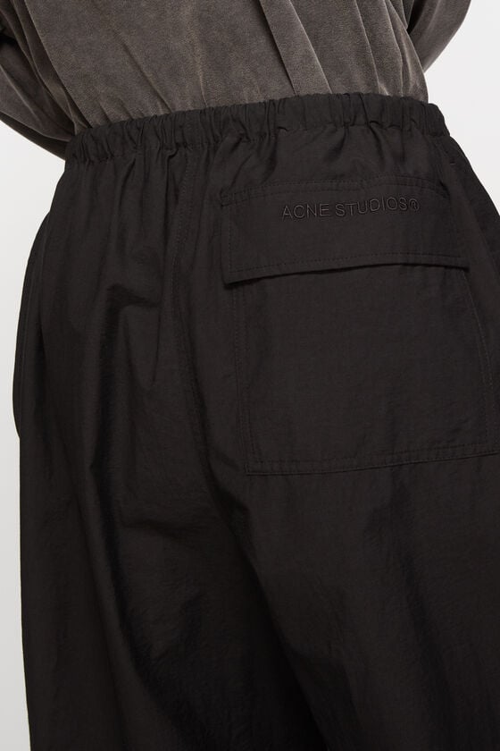 Acne Studios Hose in lockerer Passform Im Verkauf