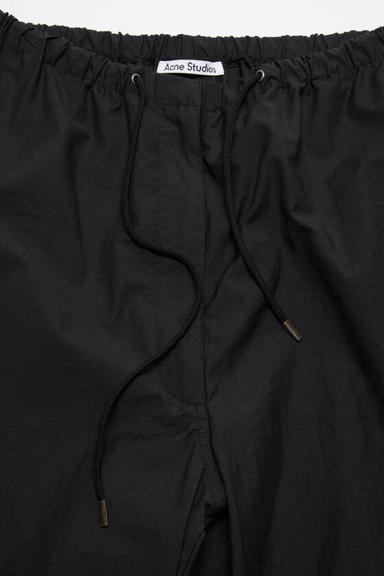 Acne Studios Hose in lockerer Passform Im Verkauf